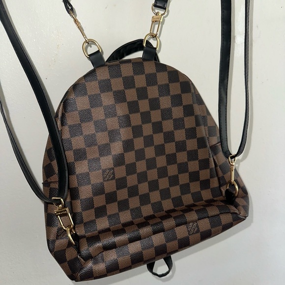 louis vuitton backpack small damier Denim Monogram Patchwork Palm Springs Mini Blue Rouge 1753868 FASHIONPHILE Top zipper closure LV Mini Palm Springs Damier